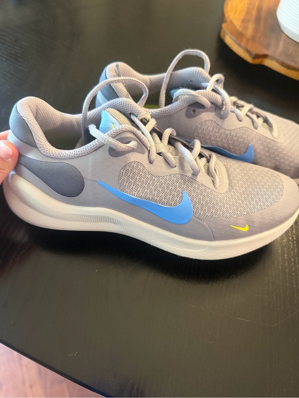 Nike Kids Gray Sneakers with Blue and Yellow Swooshes